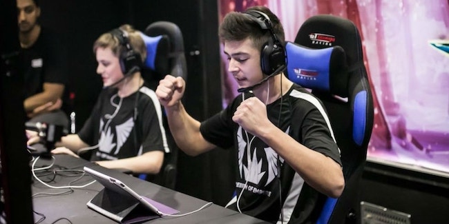 esports team playing on tablet pc