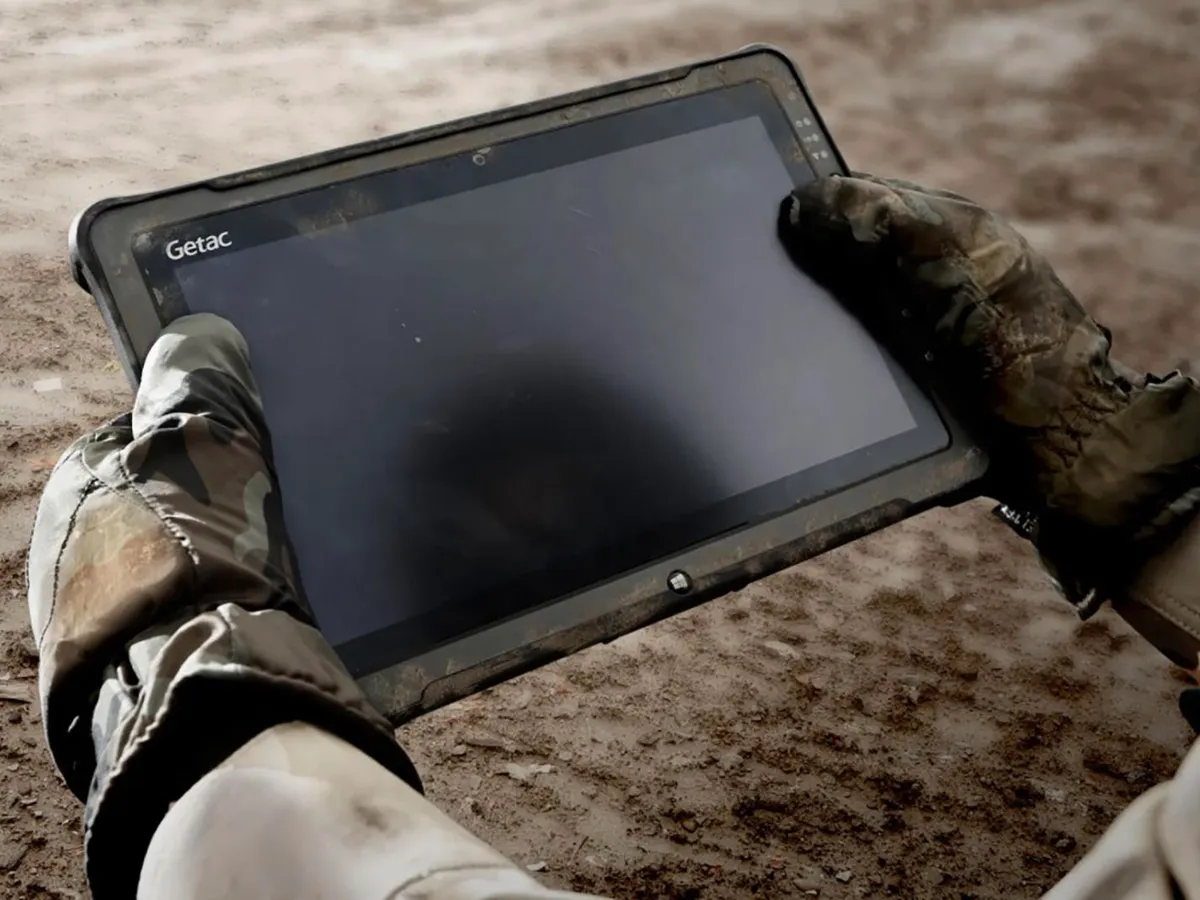man holding rugged tablet setac